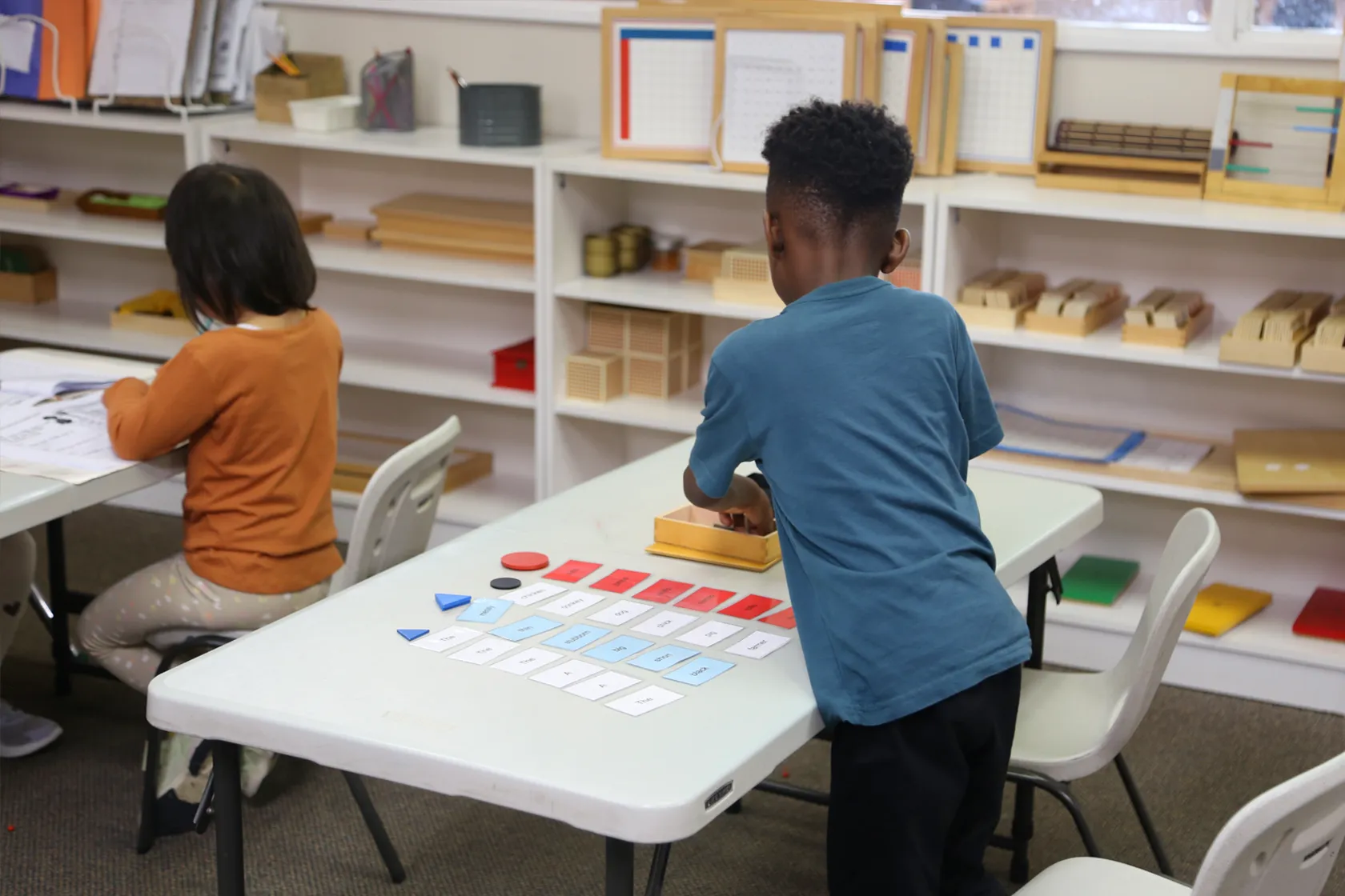 Colourful practical life materials in the Montessori classroom