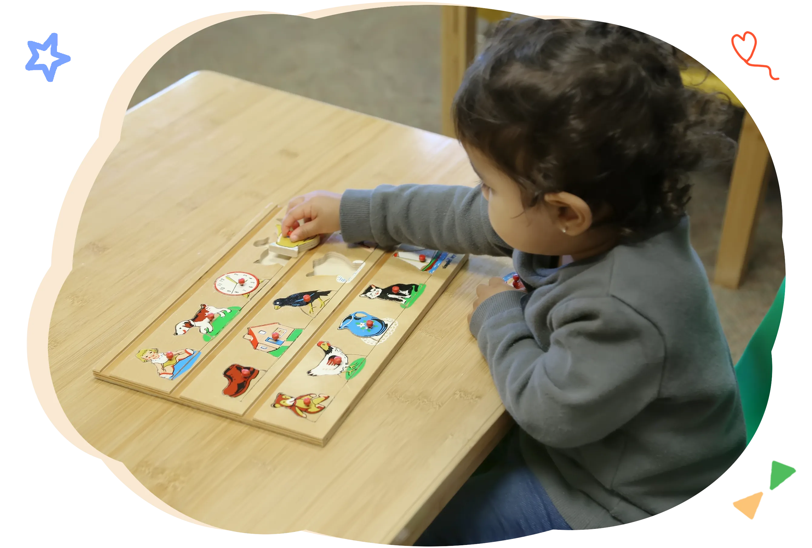 Children exploring Montessori materials in a Casa classroom